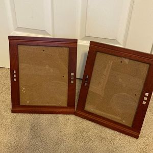 Set of 2 8x 10 brown wooden frames.